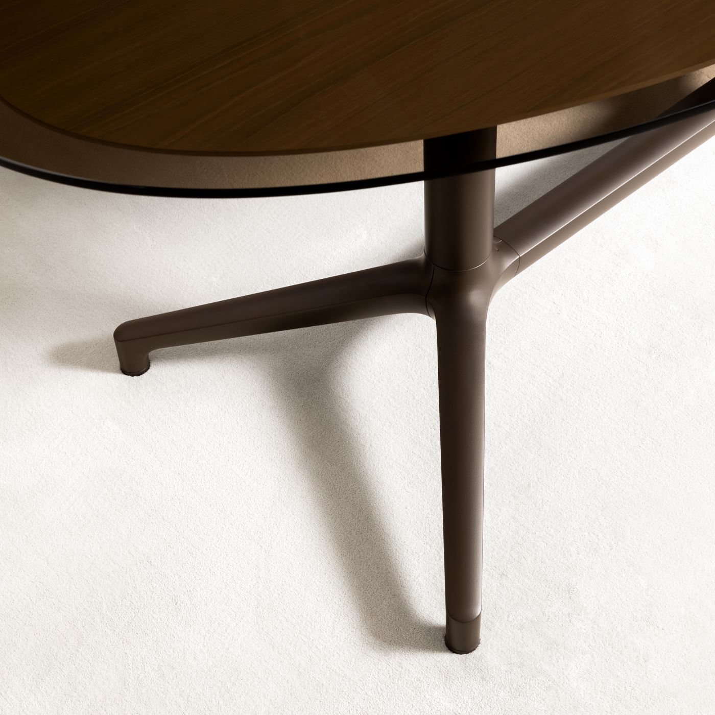 A luxuriously appointed Helm table with tinted bronze glass surface.