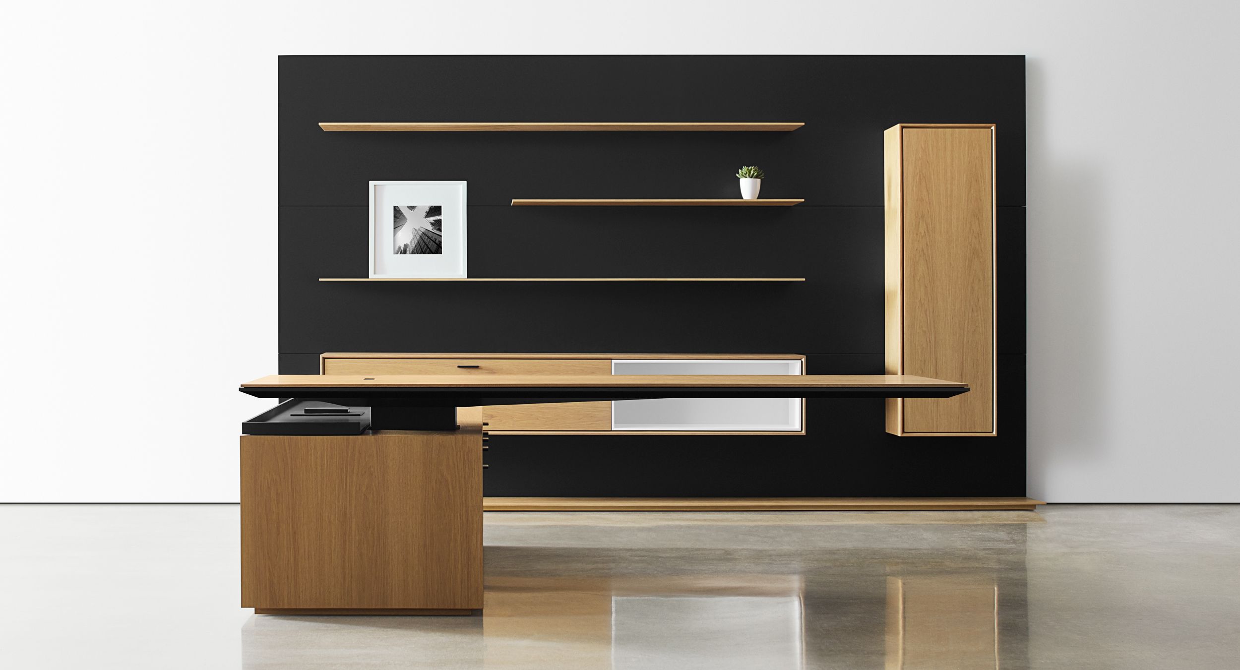 Defy gravity with an adjustable-height, cantilevered desk surface.