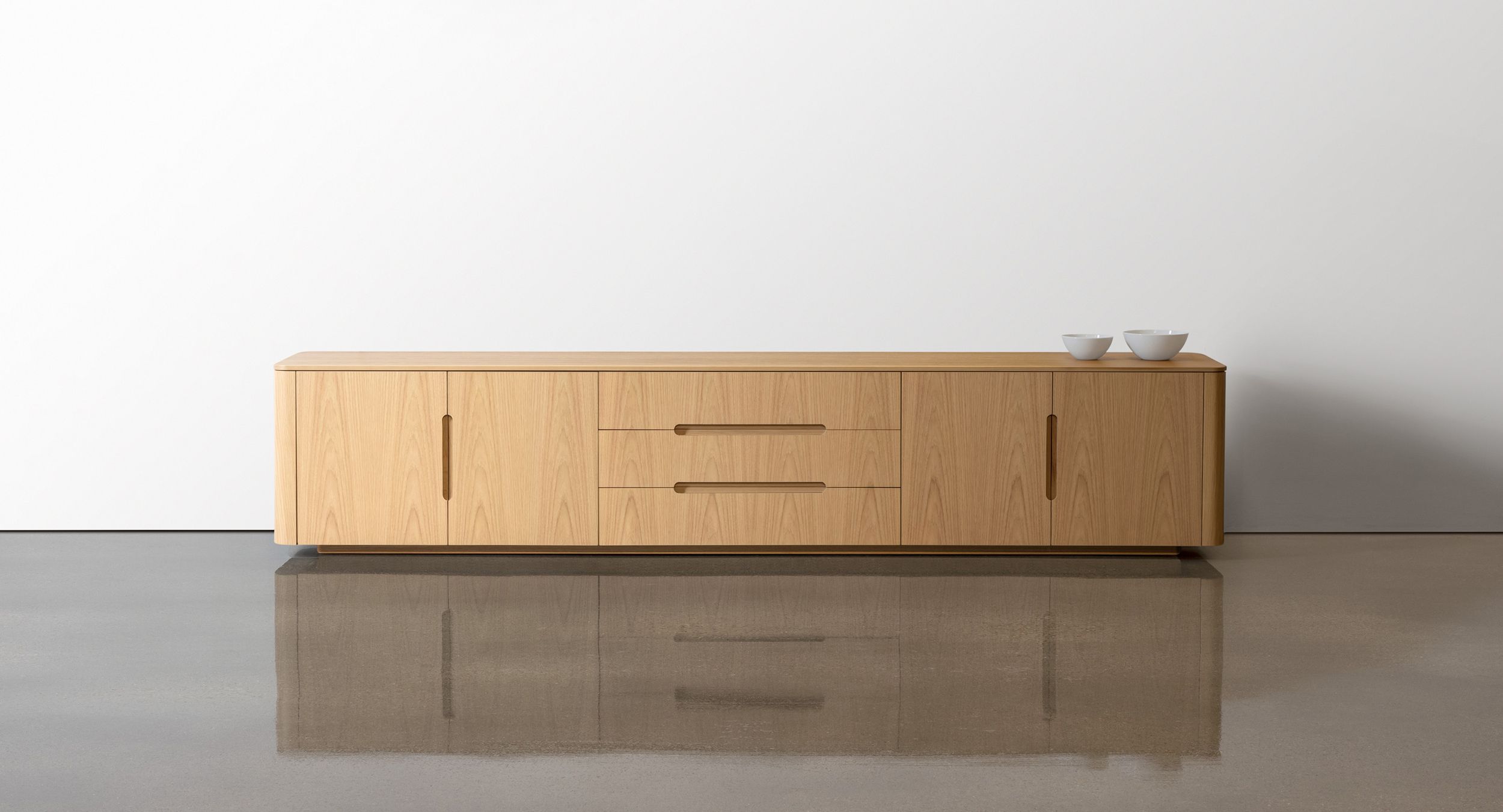 Crew sideboards are a complete storage solution with graceful curves to soften your modern meeting space.