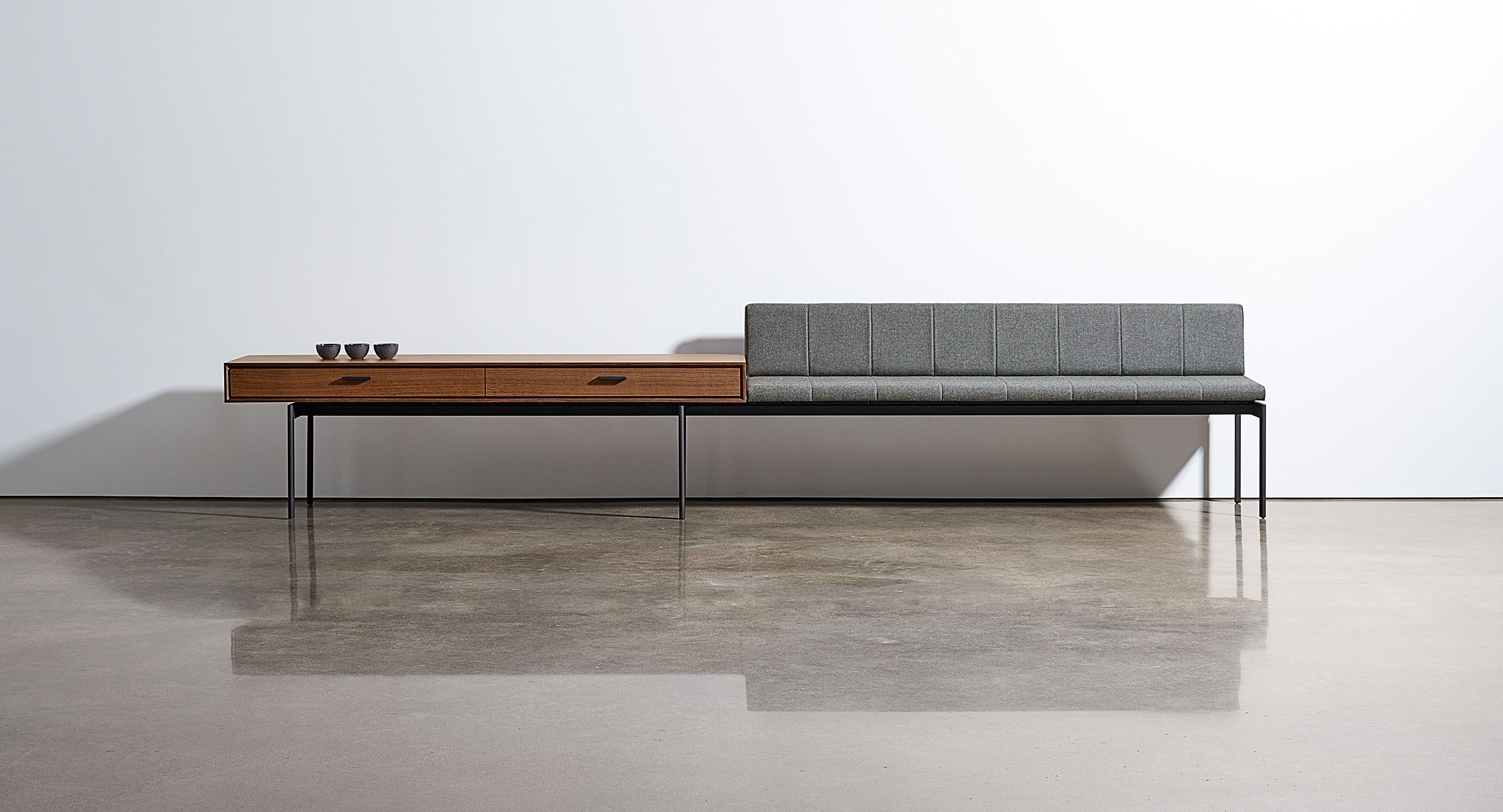 Halo seamlessly integrates gallery seating with storage elements.