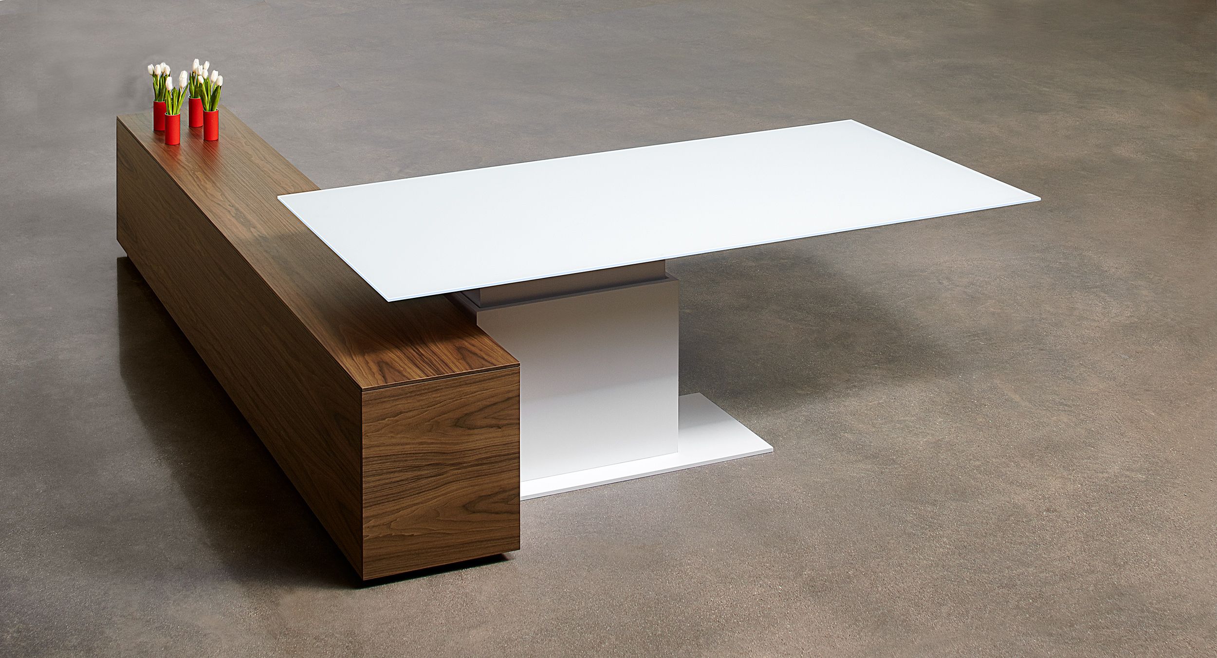 This adjustable-height desk features a beautifully-cantilevered surface.