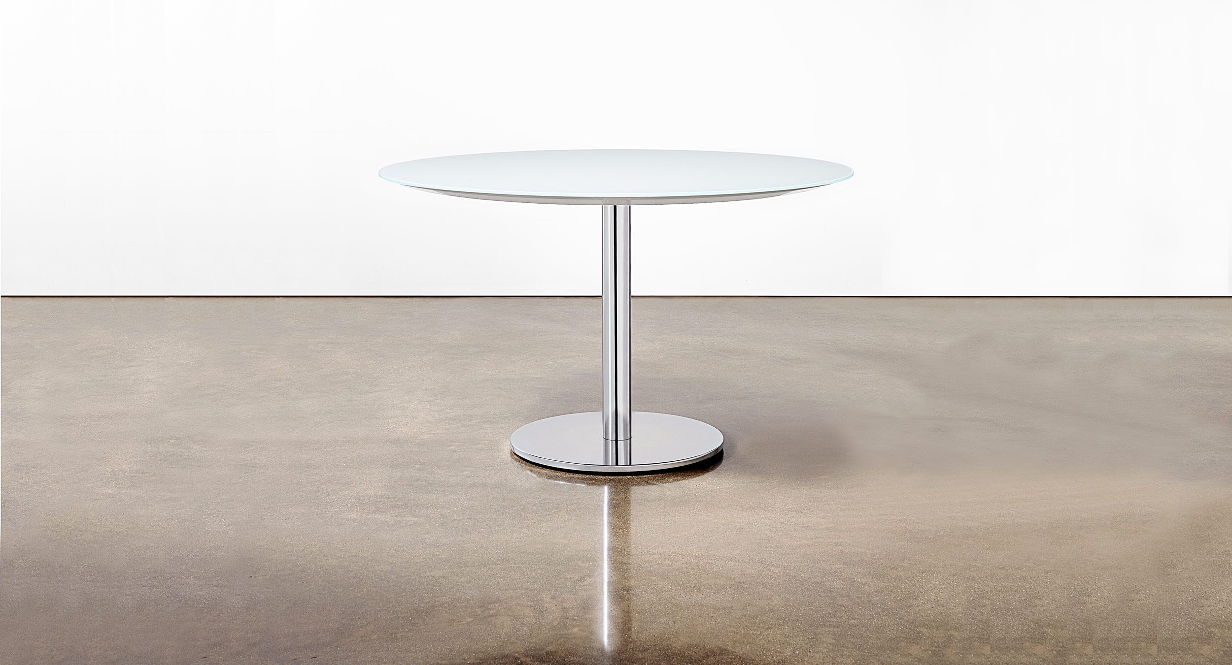Glass table with Disc base
