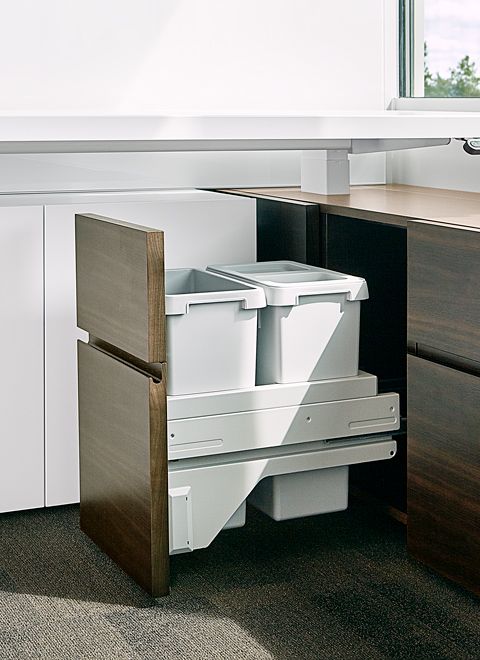 All waste bins, CPUs, and even a few refrigerators  are cleanly integrated into the furniture solution throughout the office.