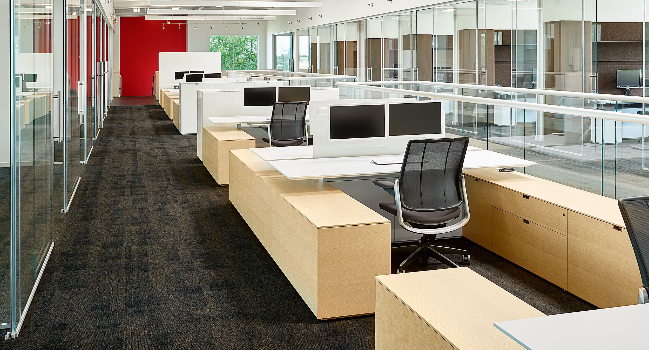 Adjustable-height desking, high gloss acrylic screens, and sleek low storage highlight our sales support workstations.