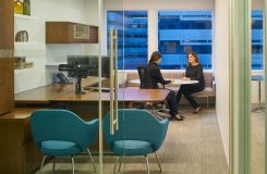 Universal attorney offices feature adjustable-height desking and a comfortable meeting space. thumbnail