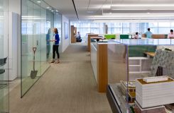 HALCON created custom NEW MILLENNIA open plan stations to realize the client's vision of invigorating, functional space. thumbnail