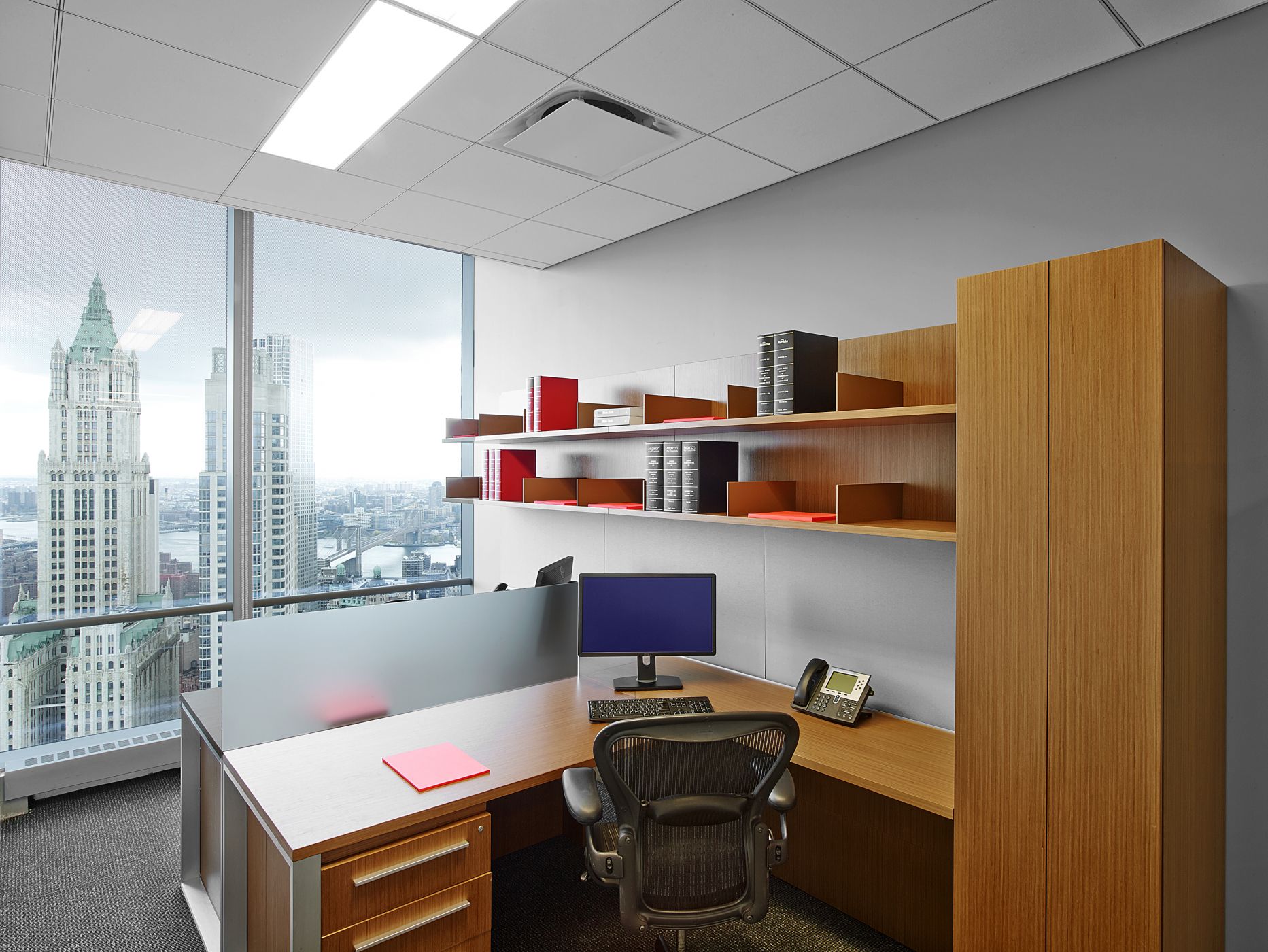 A double associate configuration includes an acrylic panel to divide shared space.