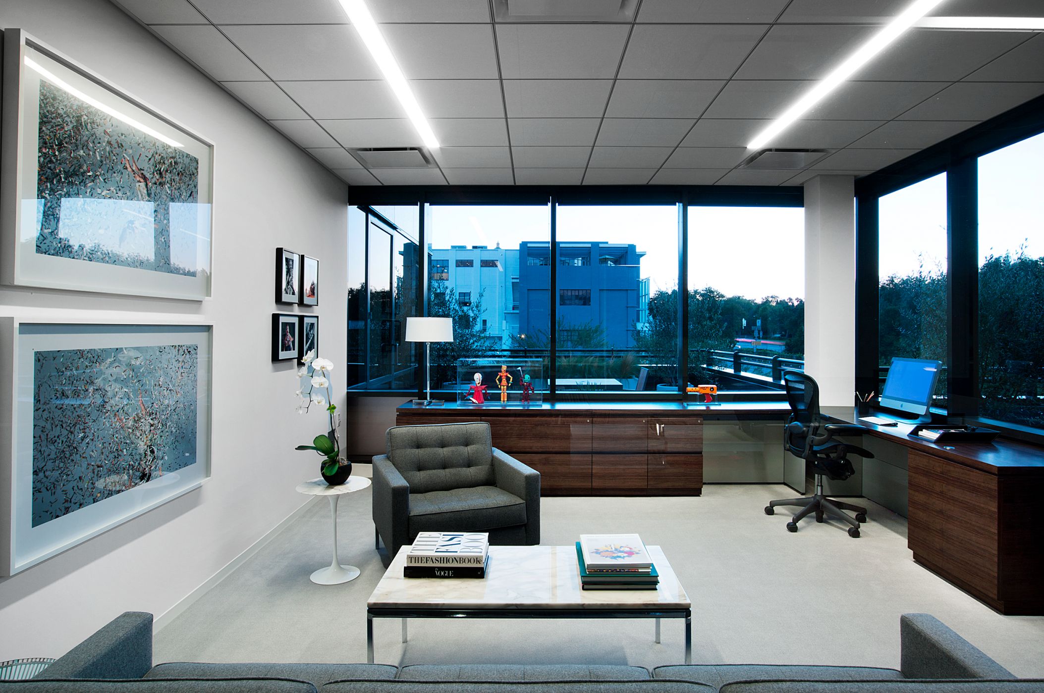 United Talent Agency's private offices feature sleek MILLENNIA desking in Quarter Cut Limba veneer.