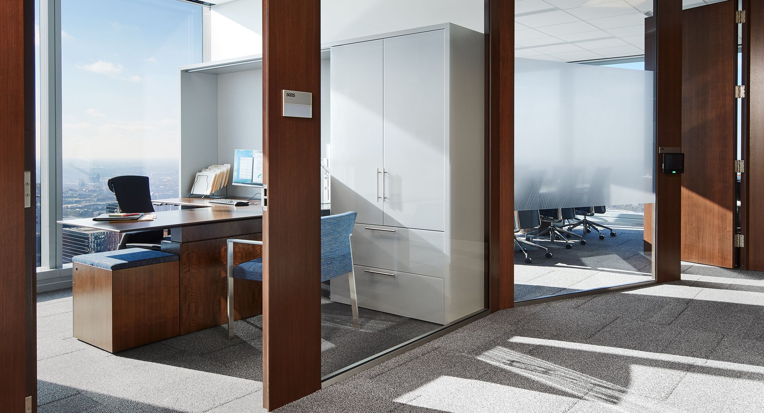 Custom private offices are perfectly tailored to meet the exacting needs of our client.
