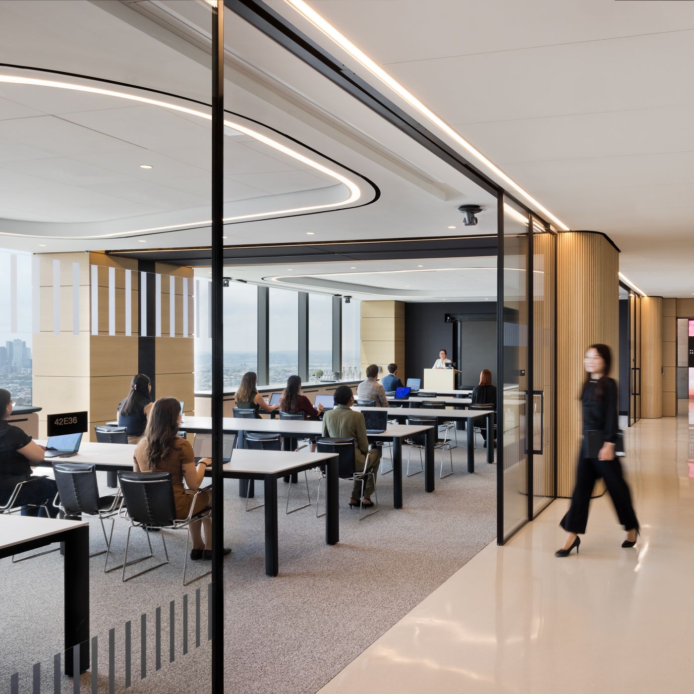 FENIX Bianco Kos surfaced Crew reconfigurable tables bring an executive level finish to this reconfigurable space.