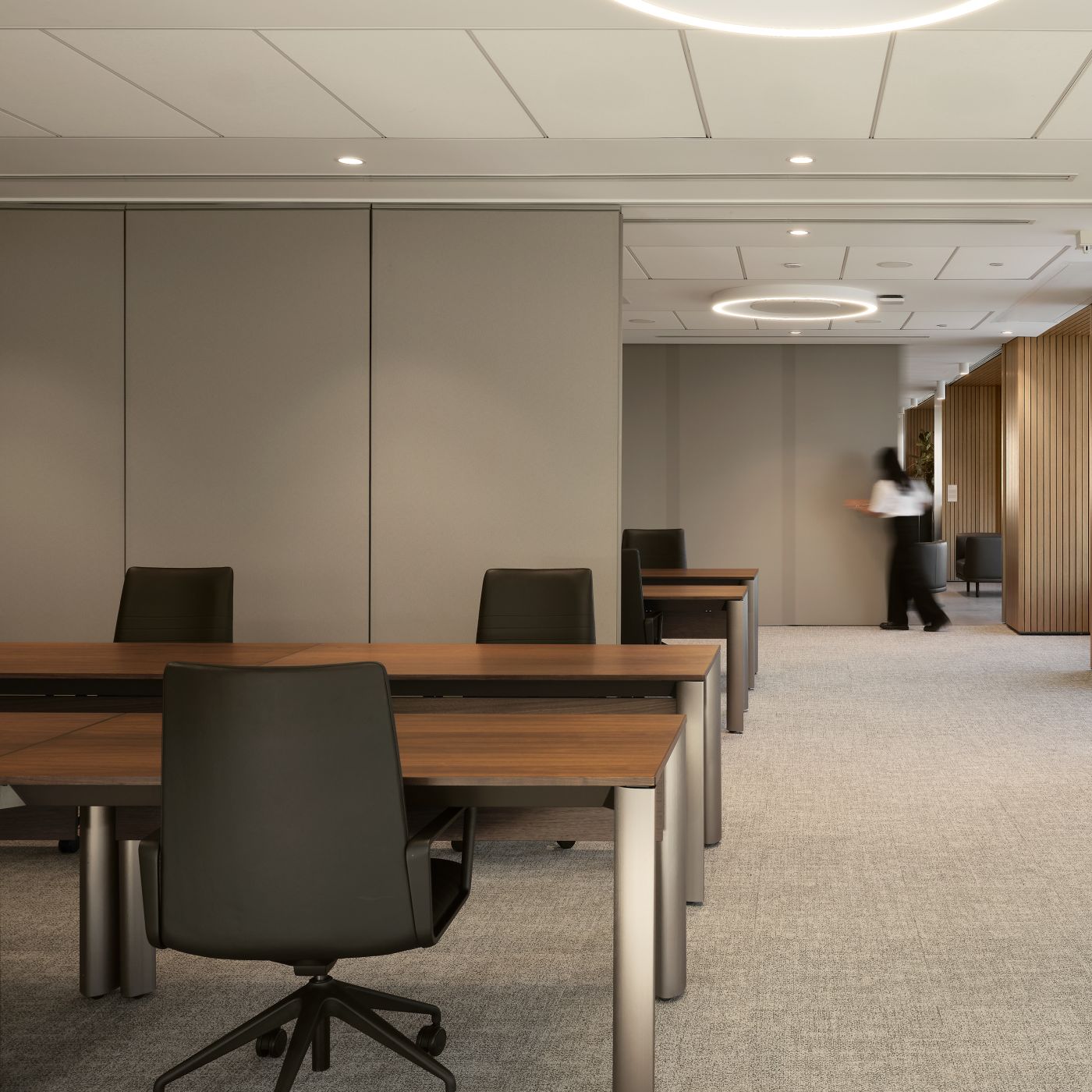 Smoked Walnut and Light Bronze Crew tables with modesty panels.