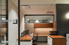 Custom Office solution in Figured Walnut, Deep Bronze, and Designer White thumbnail