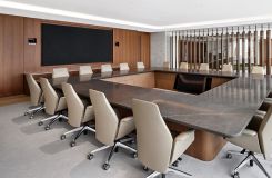 Custom 192 x 228 HALO conference table in slip-matched Walnut with Mount Grey surface, and Mink HALO Soft Edge thumbnail