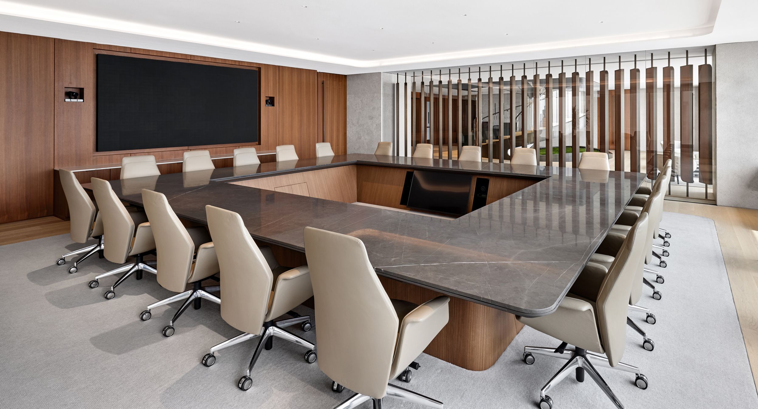 Custom 192 x 228 HALO conference table in slip-matched Walnut with Mount Grey surface, and Mink HALO Soft Edge