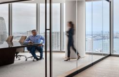 Stunning views are the perfect complement to the luxurious material palette on this custom HALCON conference table. thumbnail