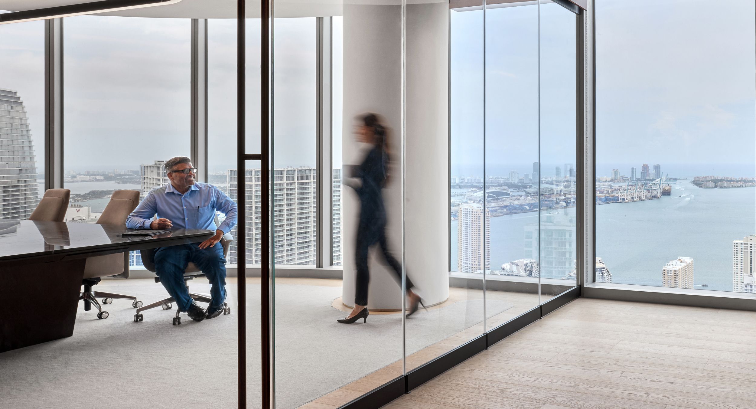 Stunning views are the perfect complement to the luxurious material palette on this custom HALCON conference table.