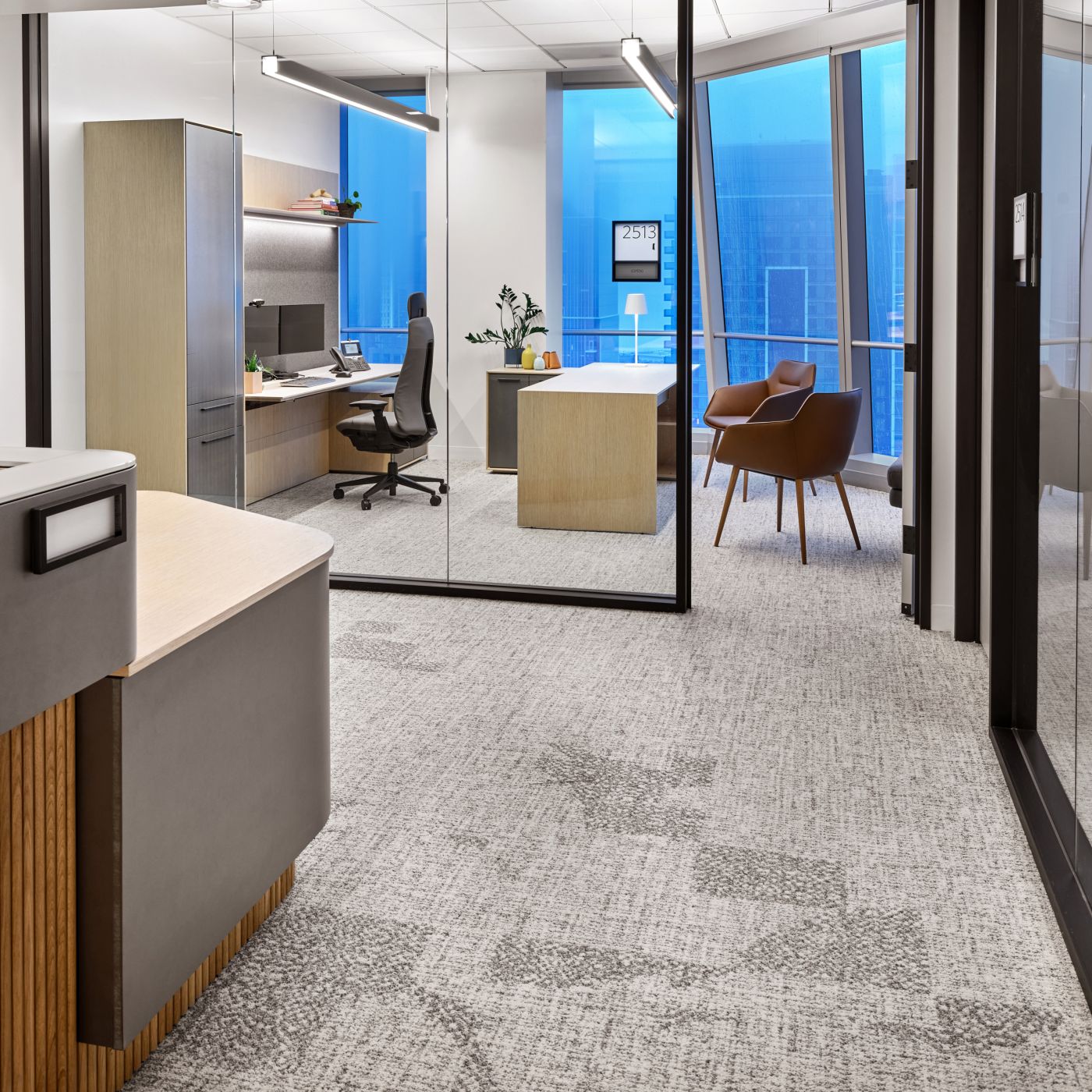 Custom Private Offices throughout the installation are tailored to their individual spaces.