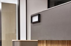 A compelling mix of materials on a custom reception space are both functional and beautiful. thumbnail