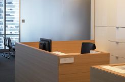 Custom secretarial stations feature Cerused Oak surrounds and high gloss white Parapan file fronts. thumbnail