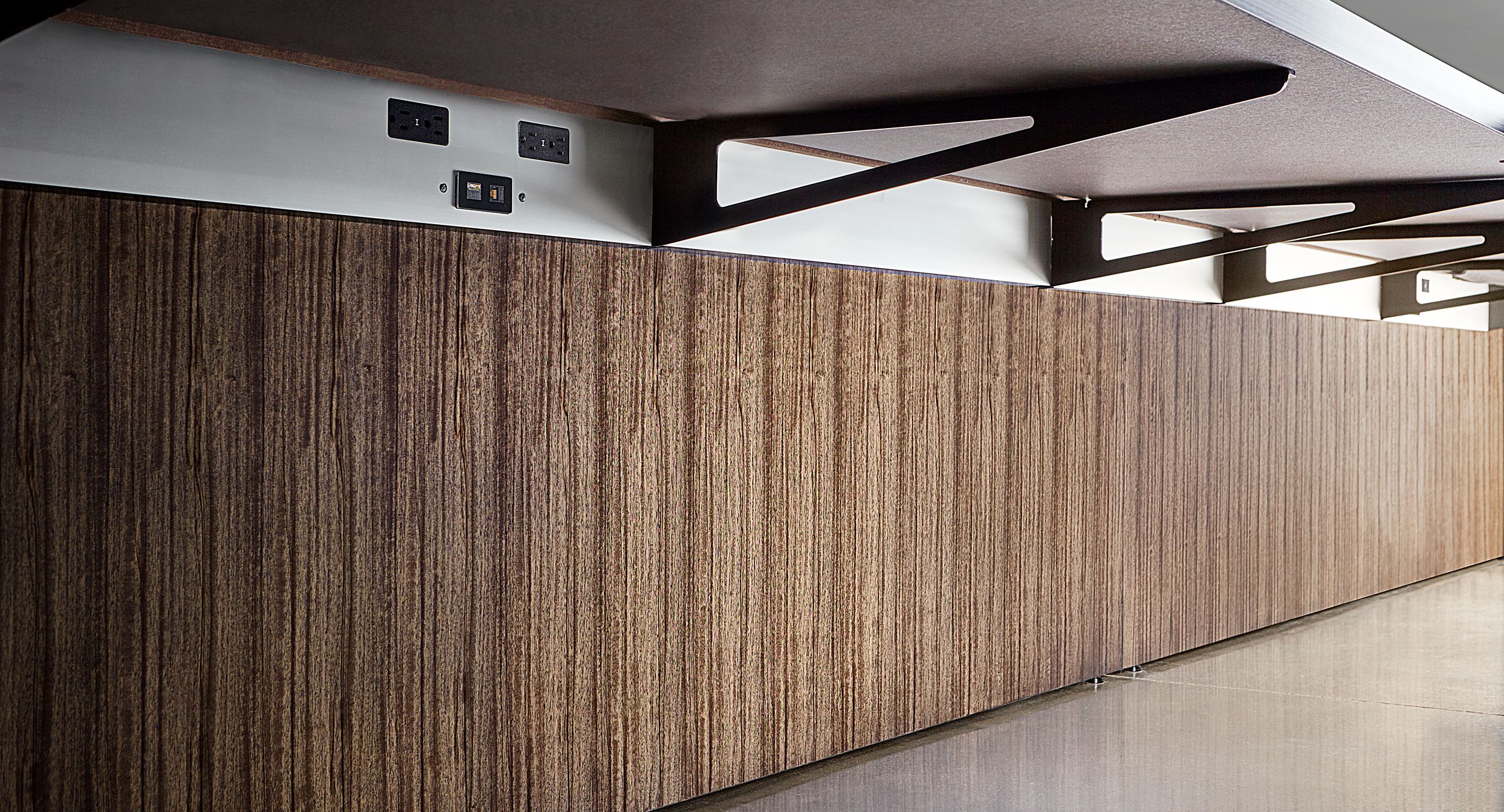 Power/data and desk support are all cleanly integrated into a beautiful, functional system.