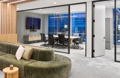 A FREYA table in White Oak is complemented by a matching HALO credenza in this medium conference room. thumbnail