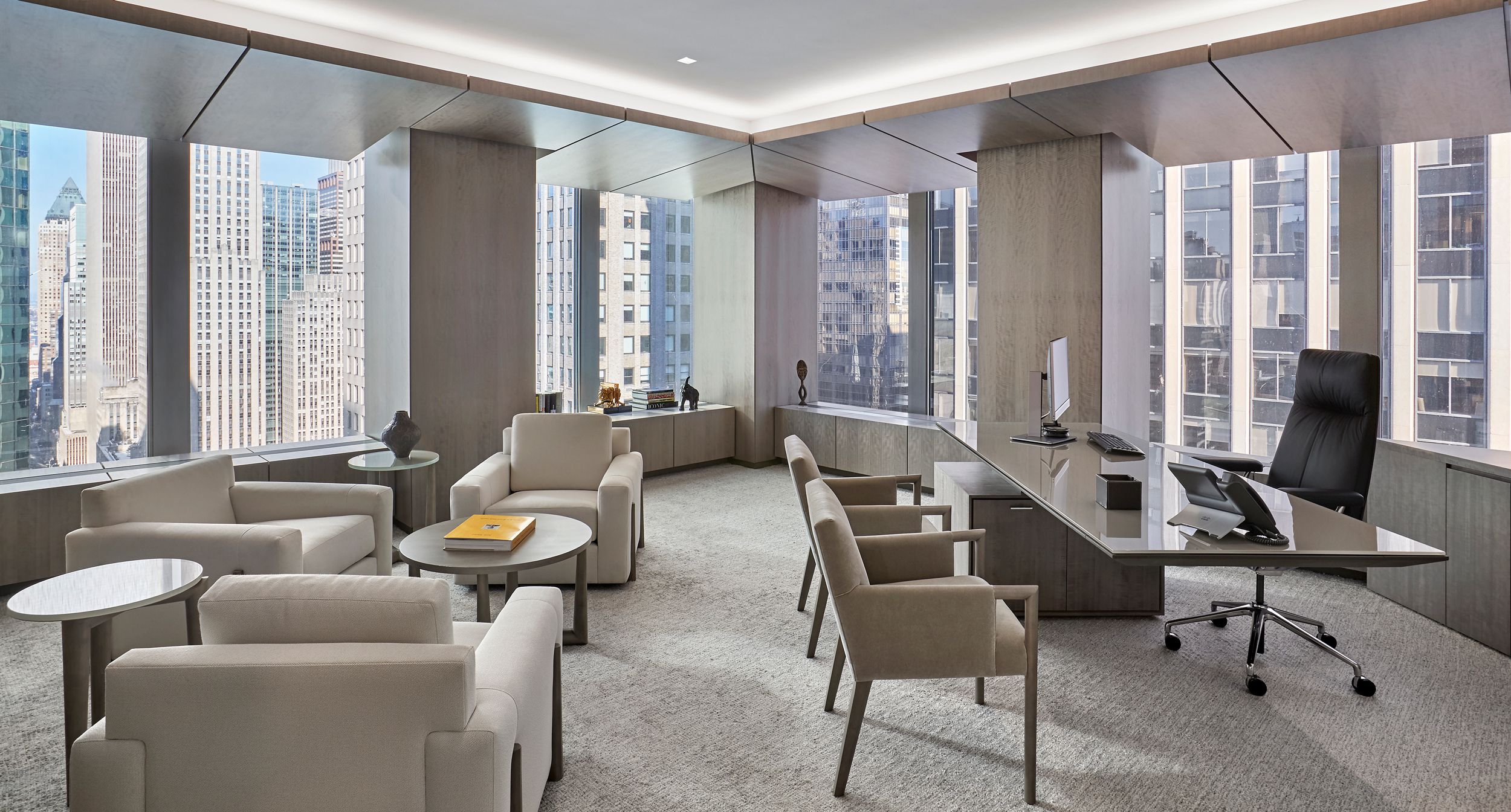 Custom Fixed-Height Halo Cantilever Desk is the centerpiece to this luxurious Executive Suite.