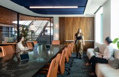 A stunning 54d x 240w stone top HALO conference table. thumbnail