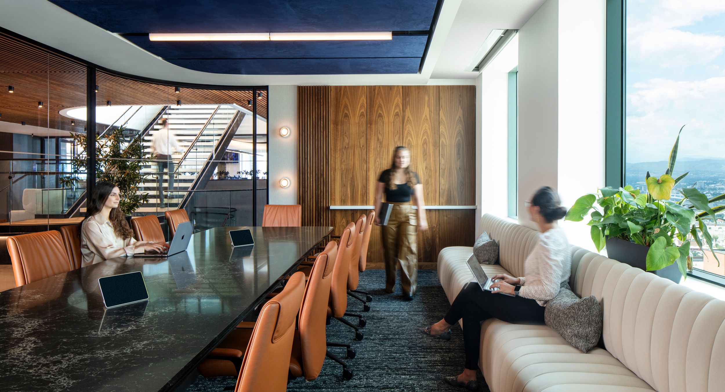 A stunning 54d x 240w stone top HALO conference table.