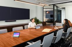A soft rectangle HALO conference table and a custom 262w credenza in Natural Flat Cut Walnut. thumbnail