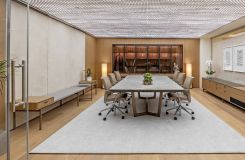 Redesigned HALO conference room with Weathered Oak credenza and wall panels. thumbnail