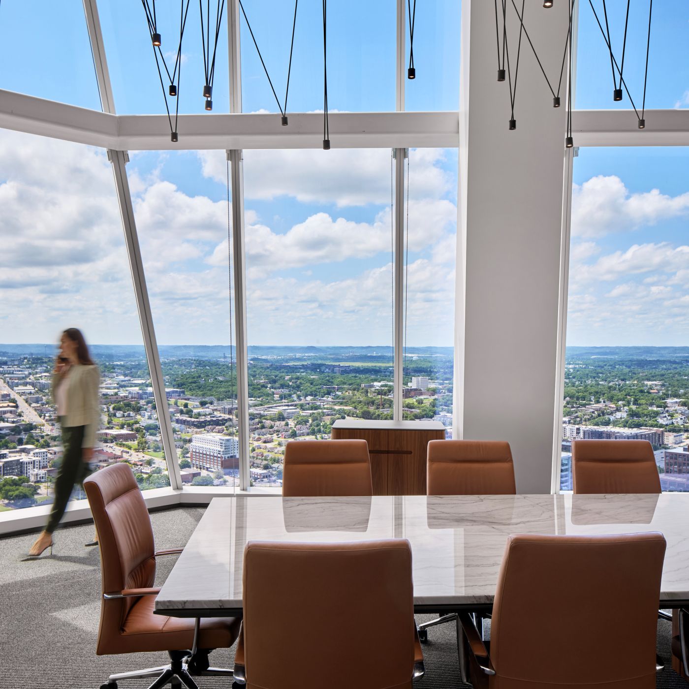 60 x 336 Halo conference table with 3cm Daltile Pegasus stone surface and Halo Soft Edge in Mink. 