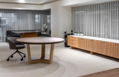 HALO wood-based conference table in Cream Ash and Mink accompanied by an stunning FREYA credenza in August Hickory and chrome. thumbnail