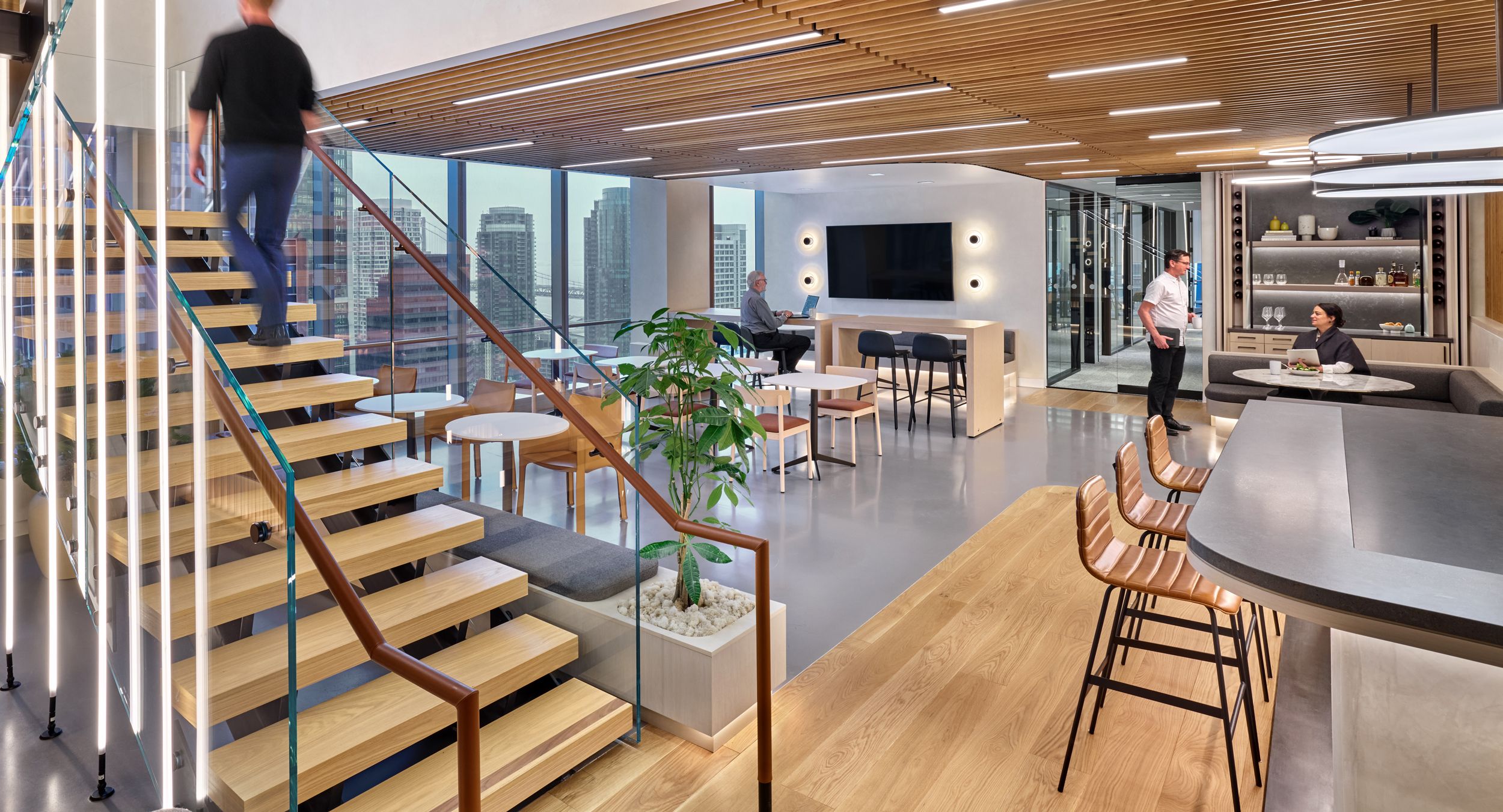 HUGO bar-height tables are the ideal choice for this dynamic communal space.