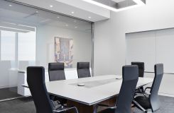 A custom MESA table features stone, glass, metal, and wood. thumbnail