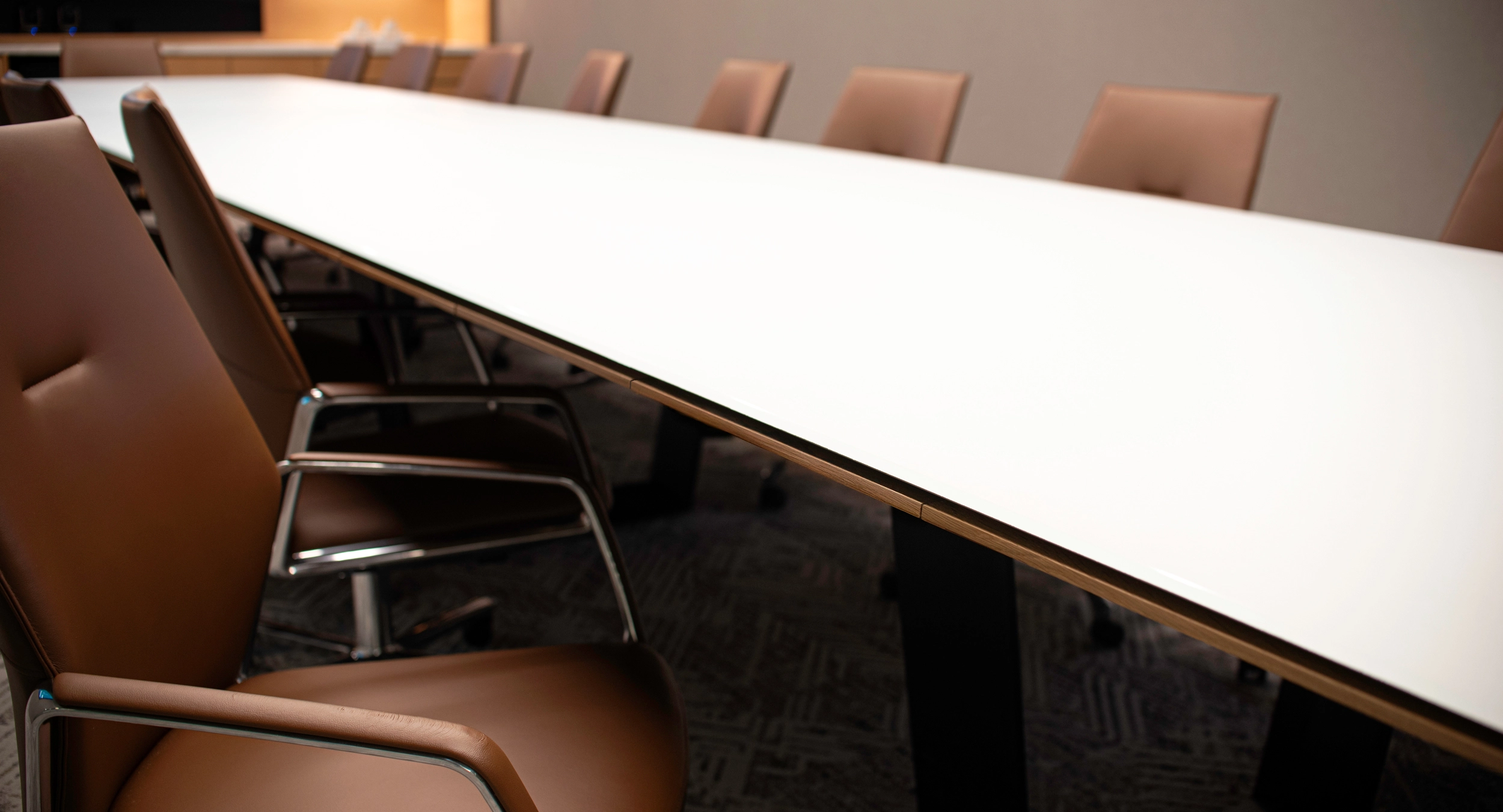A continuous edge reveal above the concealed drawer eliminates the typical mess of wires. 