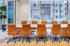MOTUS tables with etched-glass surfaces and cube bases in Rift Cut White Oak. thumbnail
