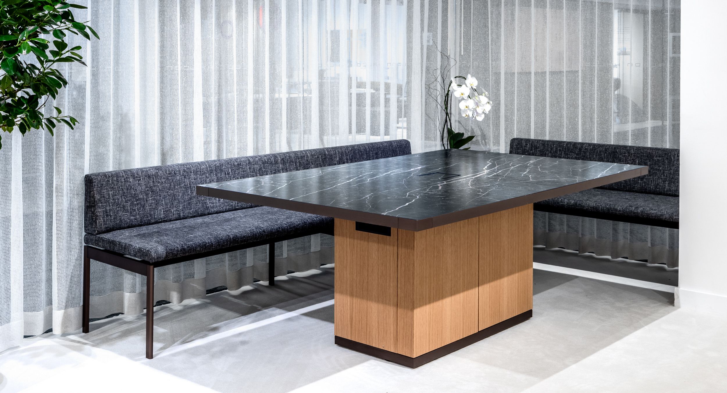 MOTUS rectangular based table and HALO bench pair perfectly.