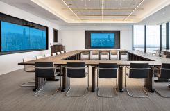 MOTUS tables in fumed figured eucalyptus deliver an executive-level finish and maximize space flexibility. Complemented by a HALO credenza and MOTUS  mobile lectern. thumbnail