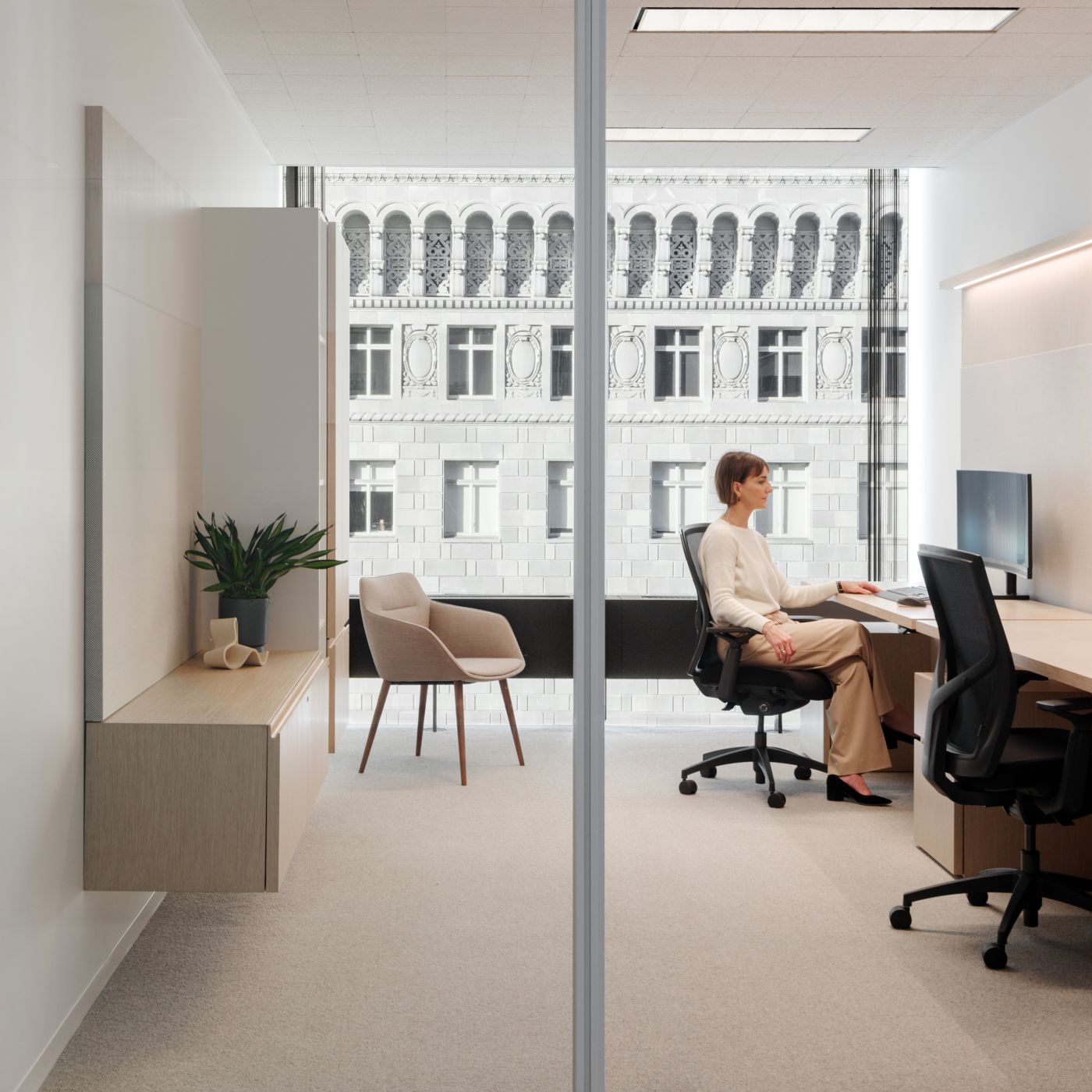 Custom New Millennia 2-seat office in White Oak and Designer White.