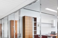 NEW MILLENNIA private offices feature a mix of open and closed storage in grain-matched Quarter Cut Walnut and White. thumbnail