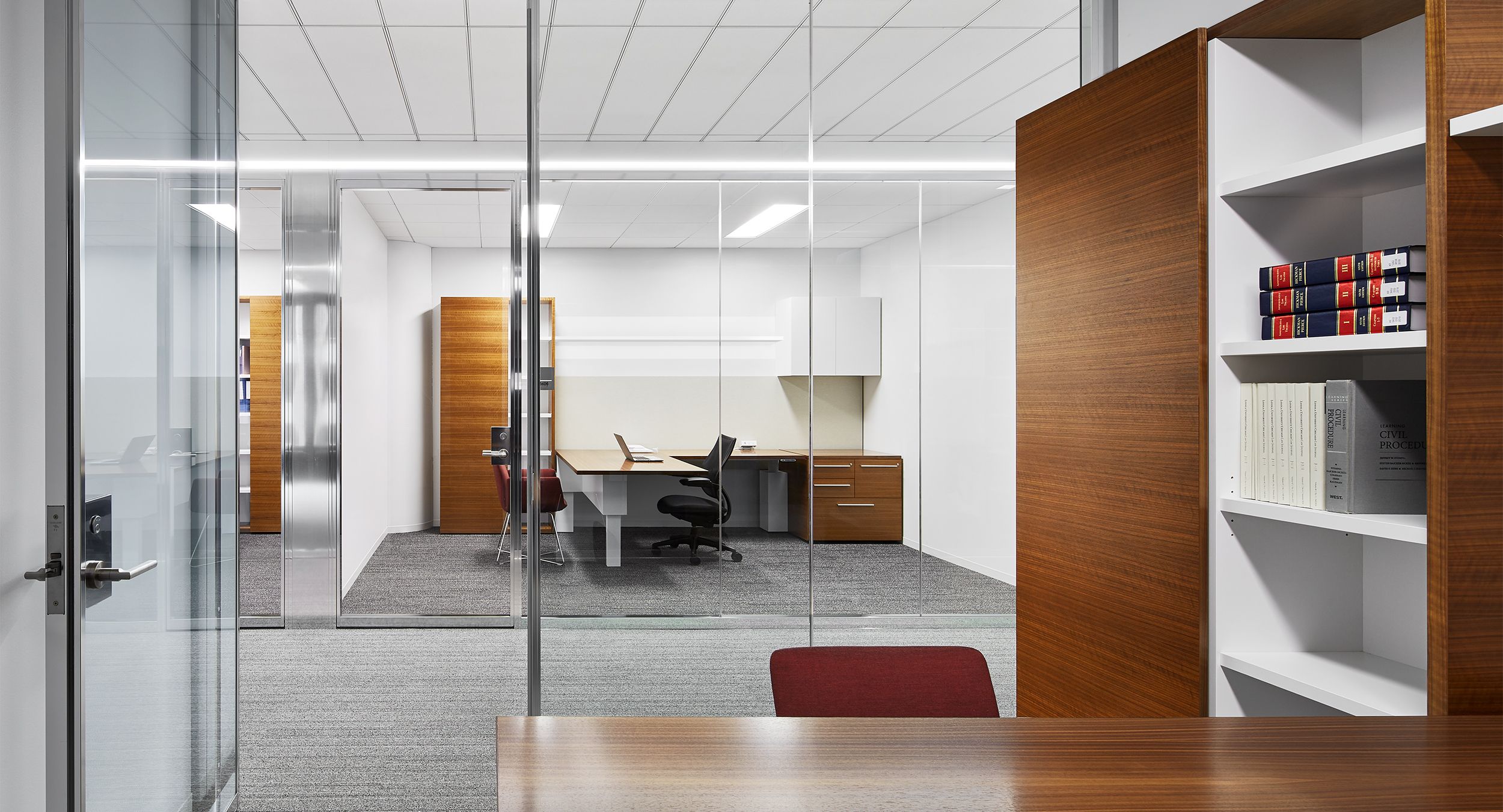 Adjustable-height desking is beautifully integrated into every office.