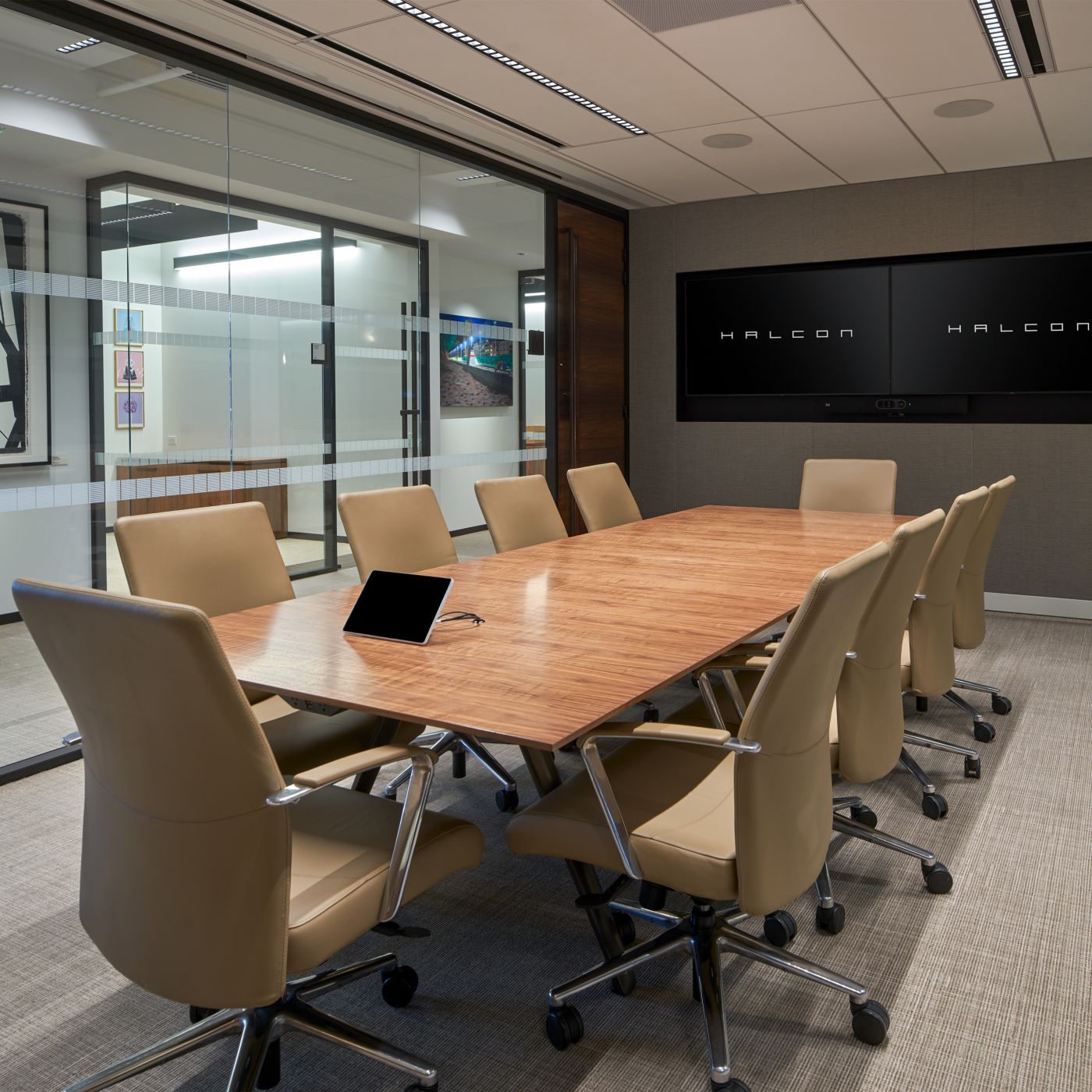 Figured Walnut Stratos conference table with Deep Bronze base.