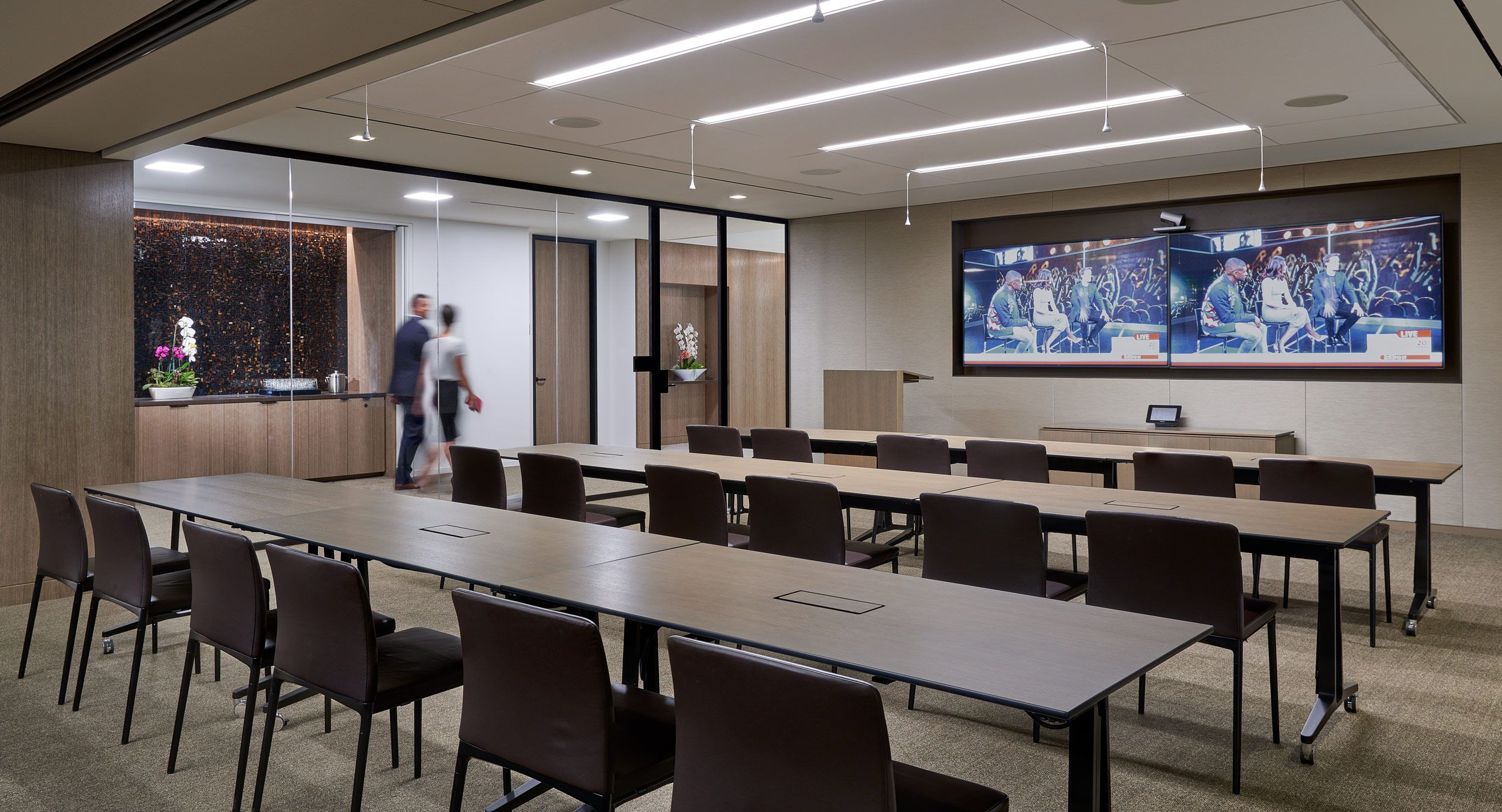 Mix products to create the perfect solution. The Motus lectern, Mesa credenza, and Skill mobile tables feature veneers custom-matched for the project.