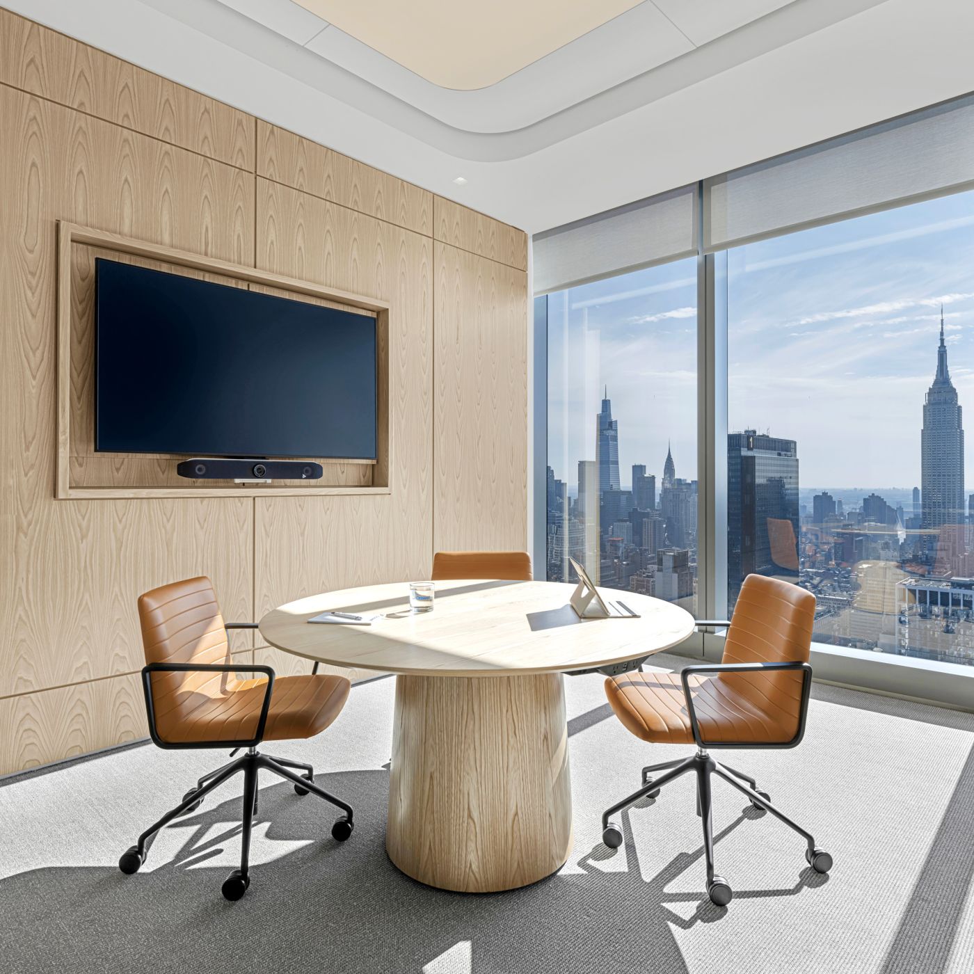 SESSIONS conference table with  power and data easily accessible at the table's edge.