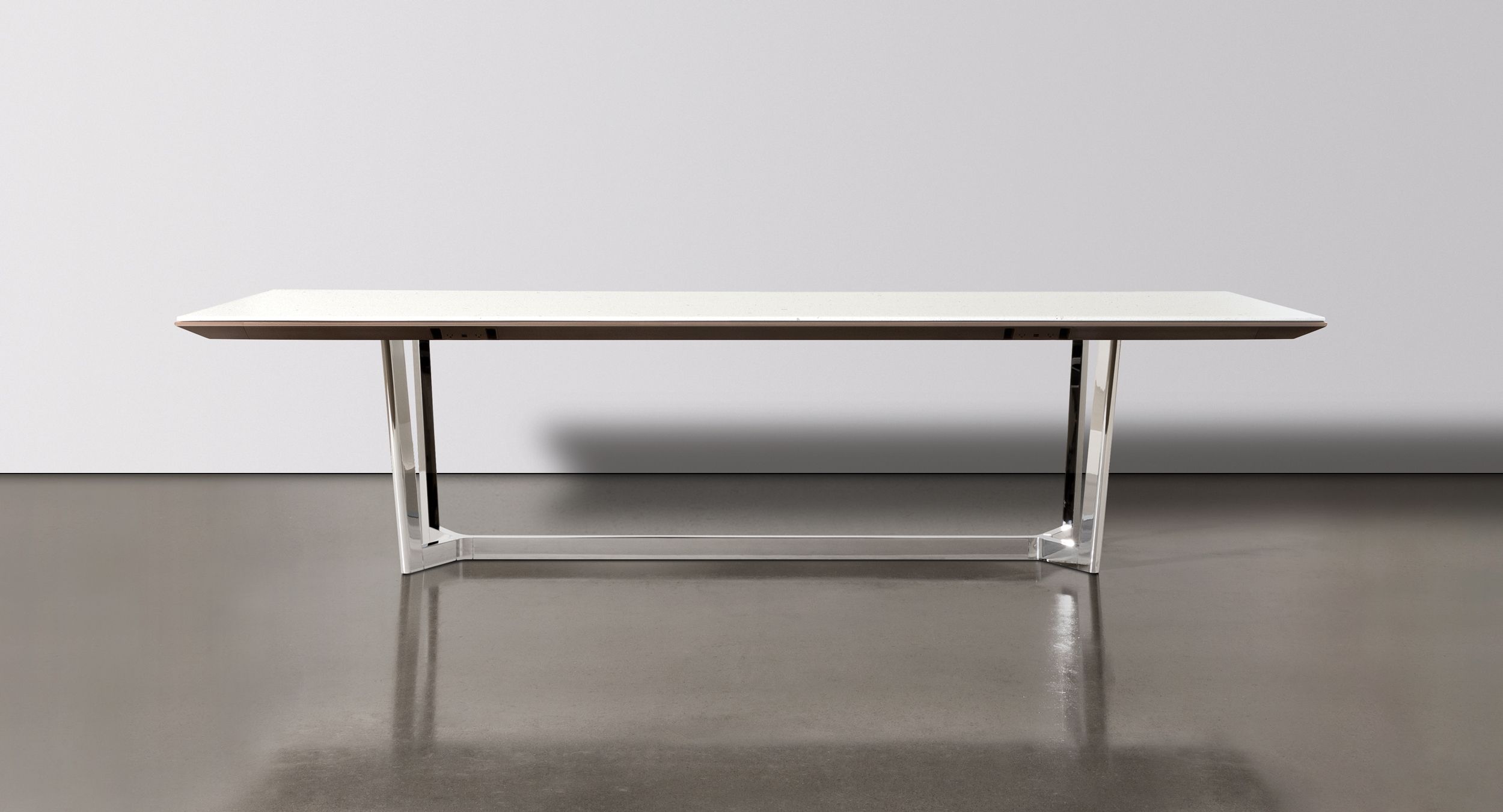 Halo table bases are offered in beautiful Polished Chrome or brushed anodized finishes and provide concealed wire pathways to invisibly integrate technology needs.