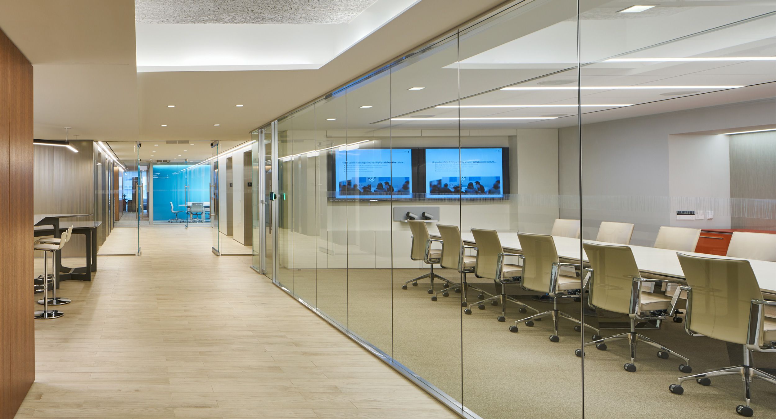 Hogan's conference center features MESA tables and custom-tailored storage credenzas.