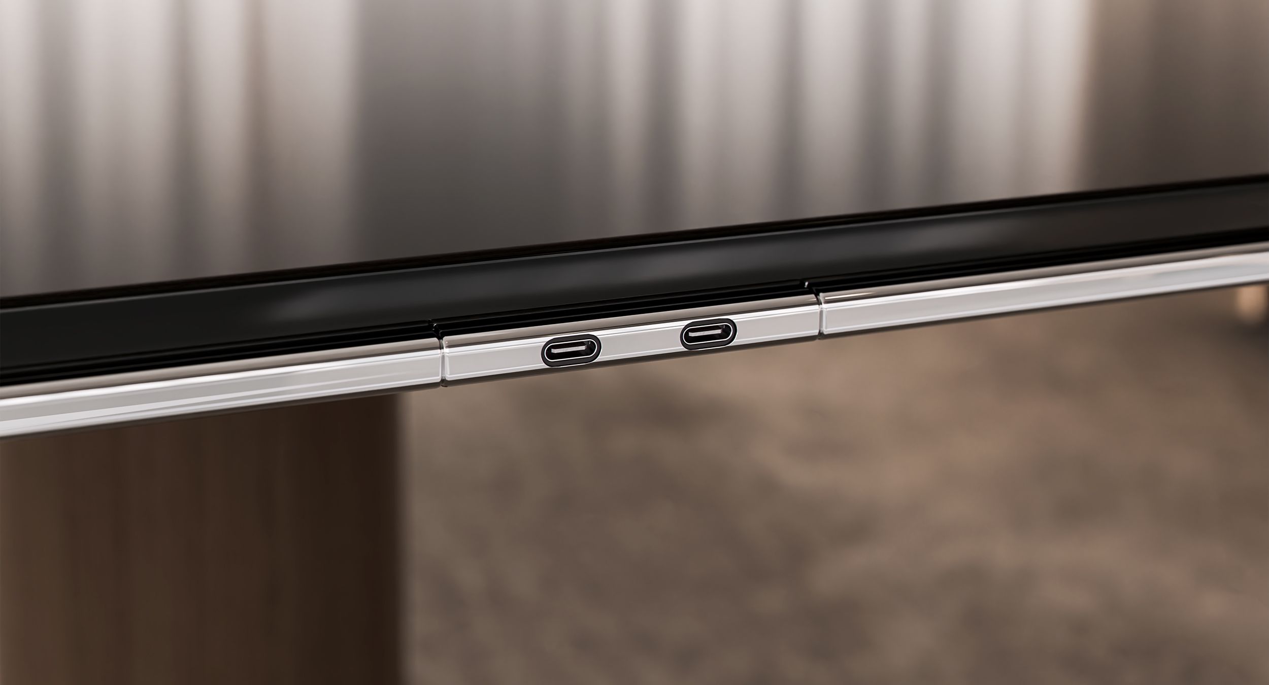 Optional dual USB-C integration into ASTORIA’s metal edge enhances connectivity with refined elegance.