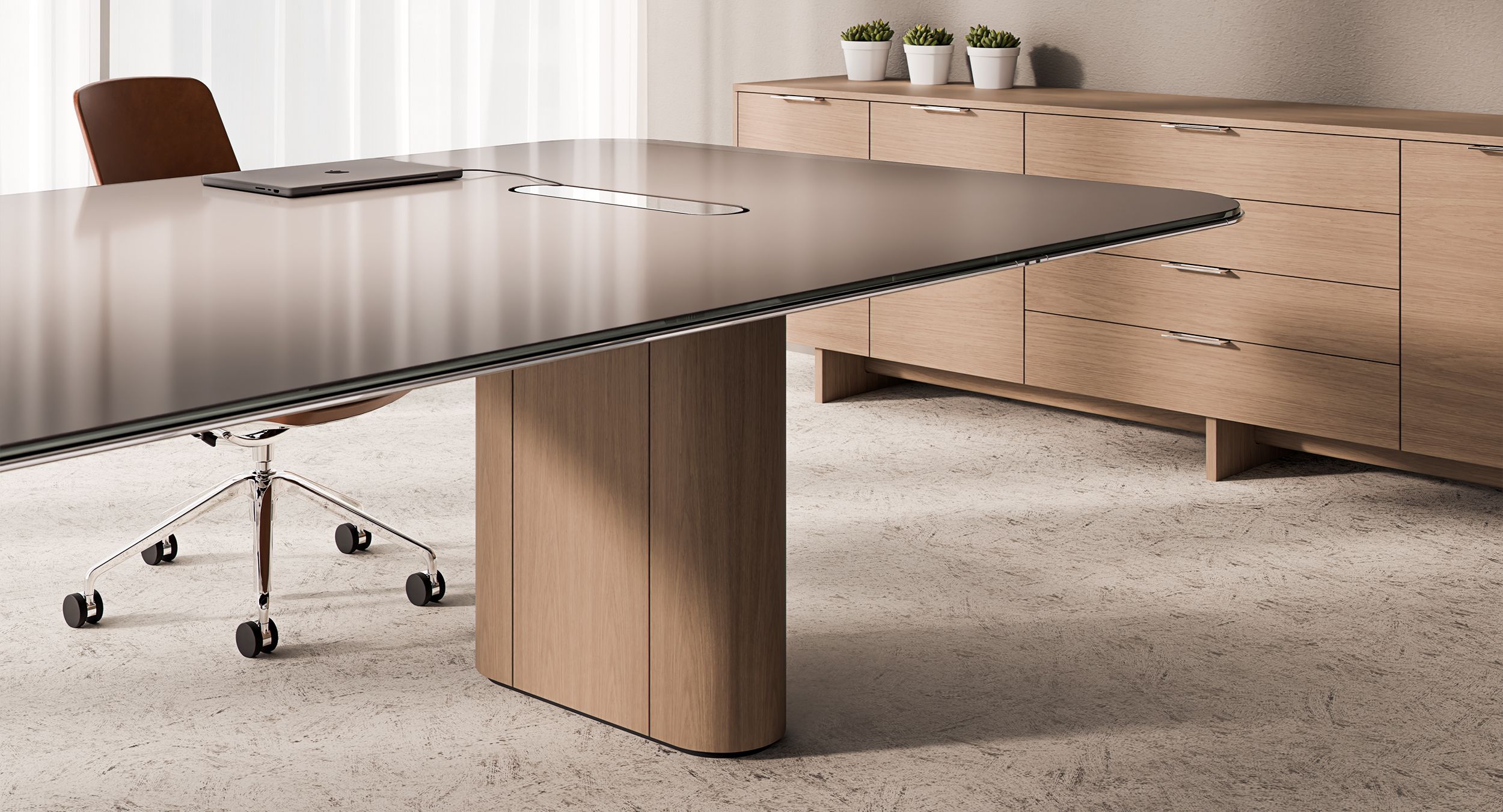 The ASTORIA table features etched glass, polished chrome perimeter edge and technology bay, and  perfectly sequence-matched veneer bases.