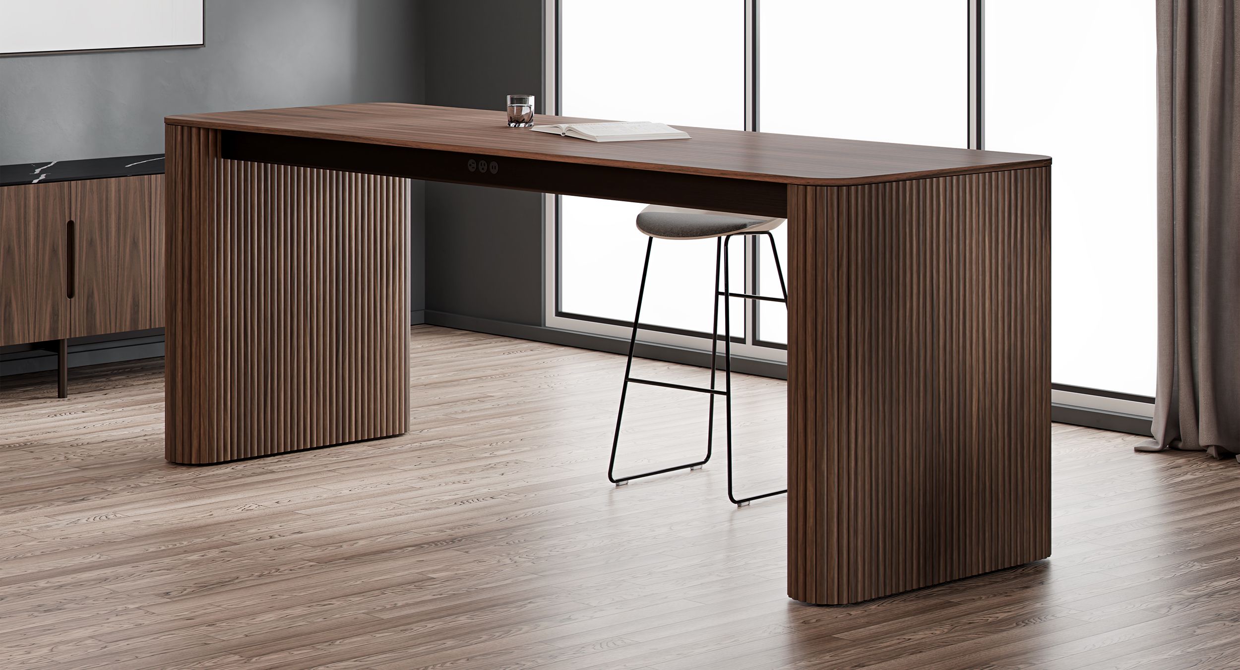 Sculptural wood tambour bases pair perfectly with meticulously sequenced matched veneer tops.