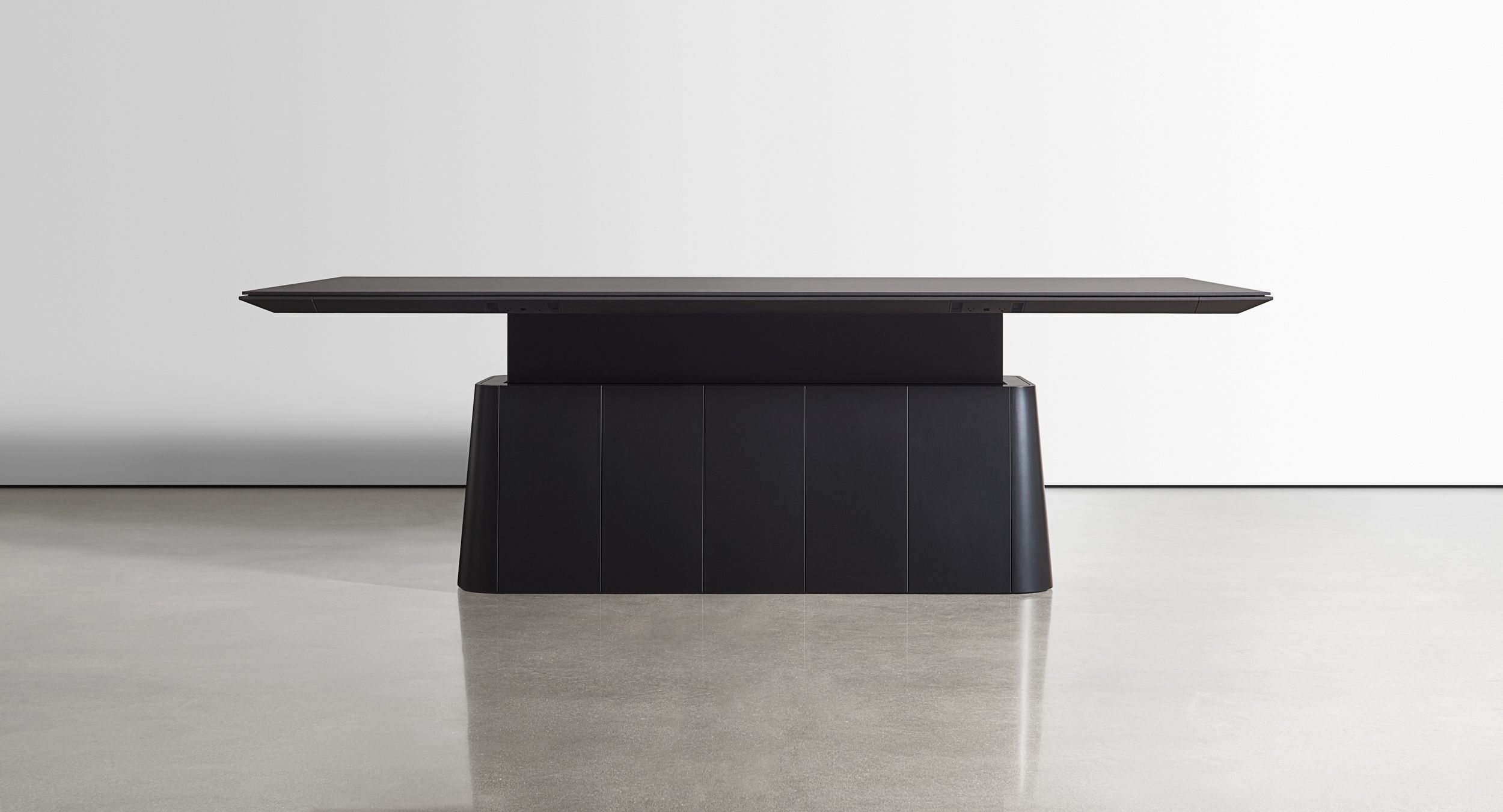 The Halo collection includes award-winning adjustable-height meeting tables.